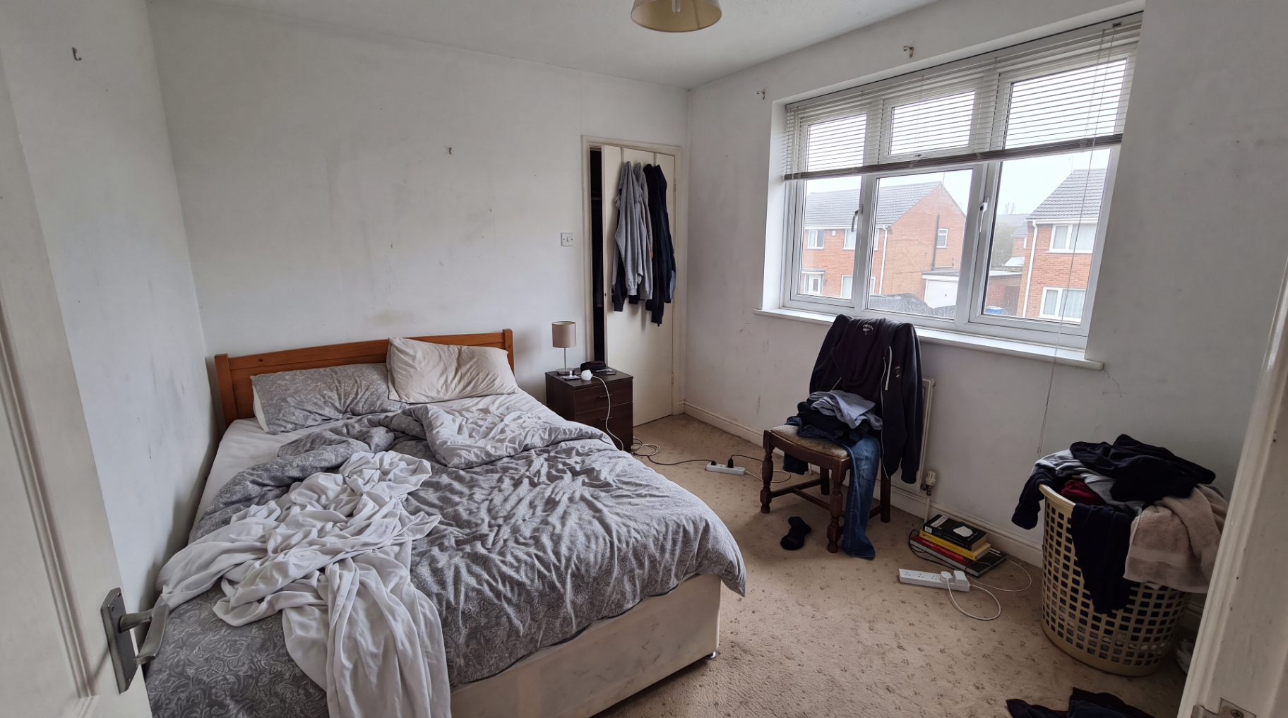 Photo immobilière après amélioration IA par Vizora — Chambre